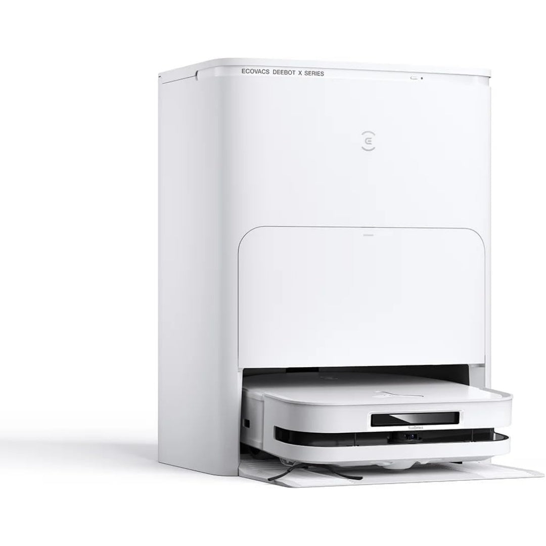 Robot de nettoyage avec base multifonction avec le vidage automatique et un mouvement rotatif